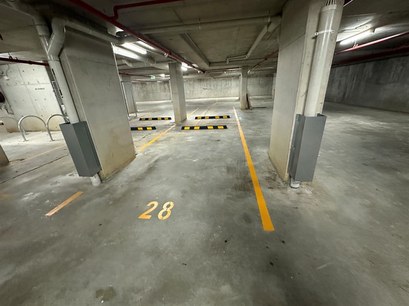Pipe guards on columns beside numbered bays