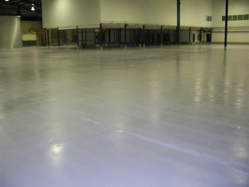Warehouse finished in light grey water-based epoxy