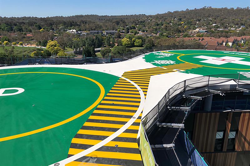 Hazard-striped walkway leading onto the helipad