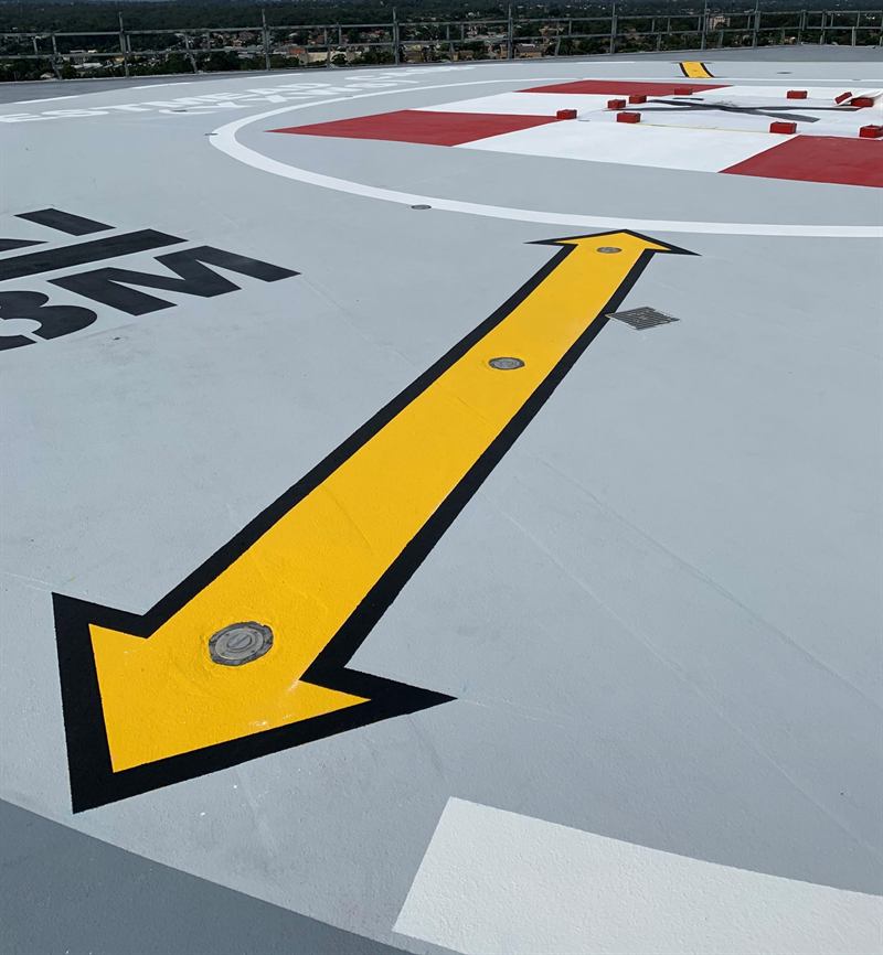 Wayfinding arrow with inset lights