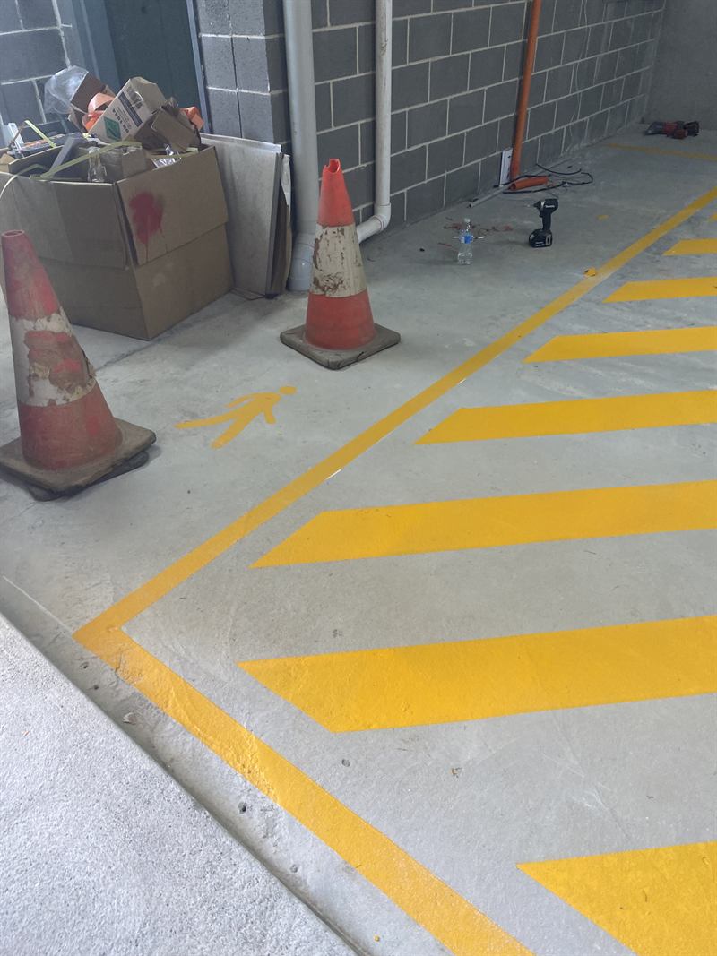 Hatched no-parking zone in a basement carpark